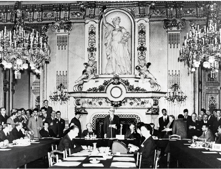 Robert Schuman speaks in the Salon de l'Horloge,  Quai d'Orsay, 1950